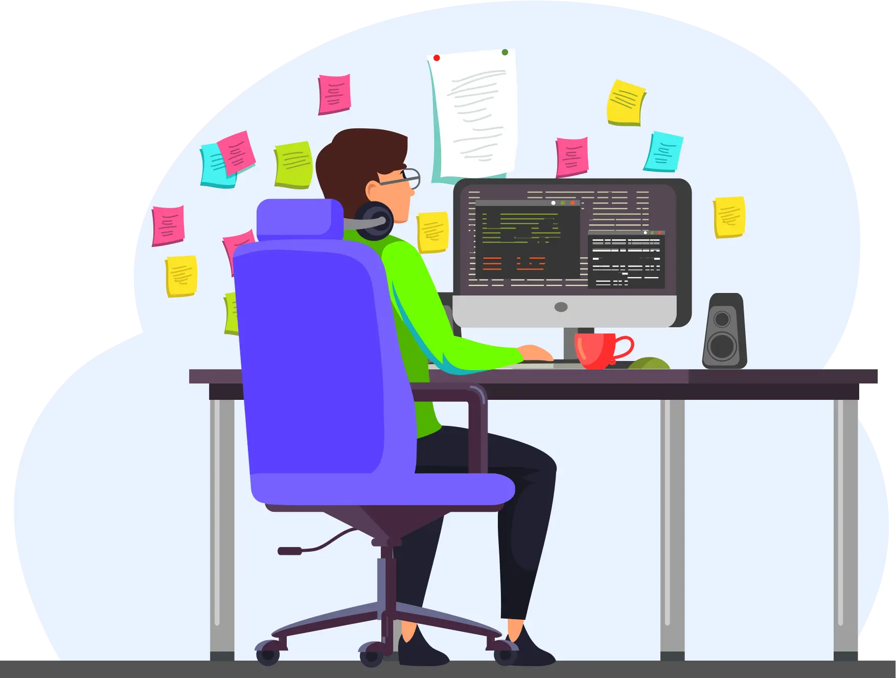 A boy working on a PC by sitting on a chair, wearing earphones. A cup on the desk and a speaker. Also, some sticky notes on the wall